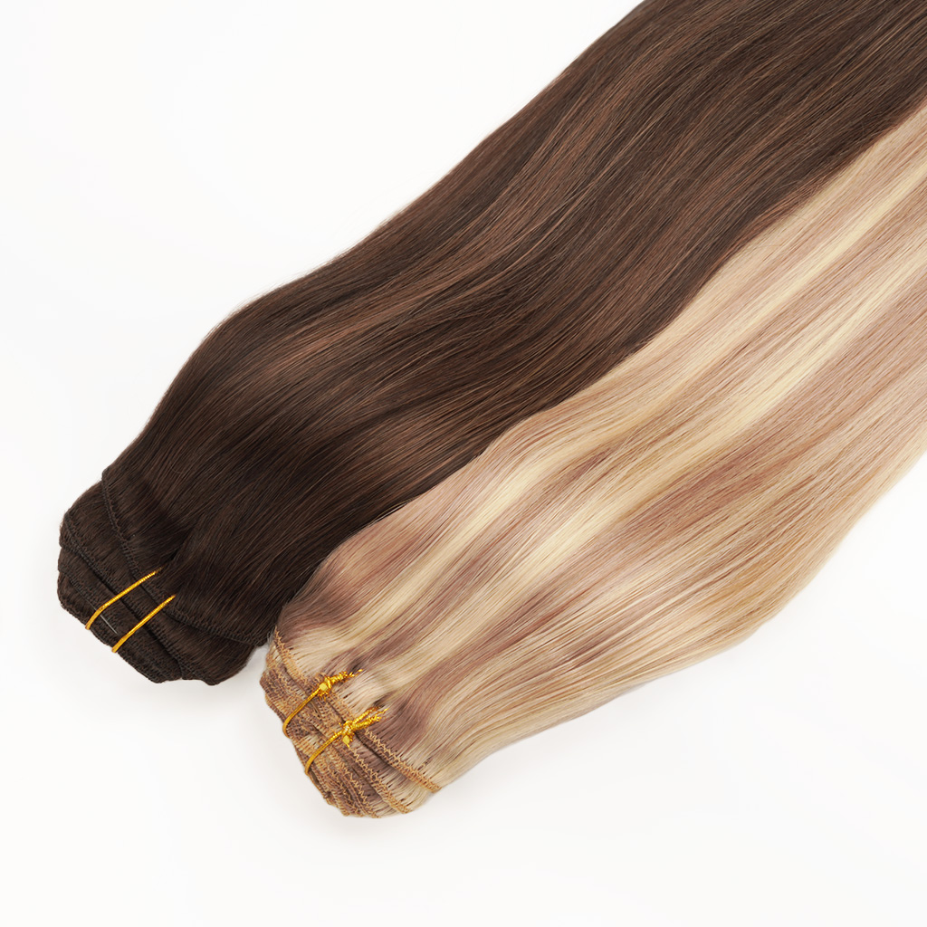Full set clip-in hair extensions in dark brown and light blonde, secured with yellow bands